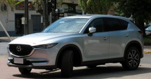 A silver 2019 Mazda CX-5 parked on the street in Wichita, KS