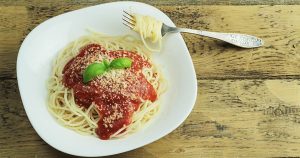 A plate of spaghetti with marinara sauce from an Italian restaurant in Sheboygan, WI